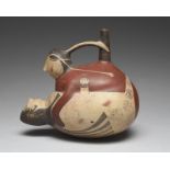 A Nazca stirrup spout vessel Peru, circa 300 - 600 AD pottery, modelled as a couple in a loving