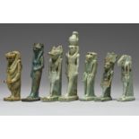 Seven Egyptian faience amulets Late Period, circa 664 - 332 BC including Tawaret, Horus, Sekhmet,