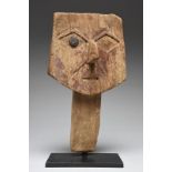 A Chancay mask Peru, circa 1100 - 1400 AD with carved lozenge eyes, one with a resin pupil, a