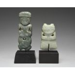 Two Atlantic Watershed pendants Costa Rica, circa 100 - 500 AD jade, one carved a figure with