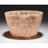 A Maya circular bowl Peten Region, Mexico, circa 600 AD onyx, on a shallow foot with flared side,