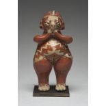 A Chupicuaro standing female figure Mexico, circa 500 - 100 BC pottery, with a parted coiffure and