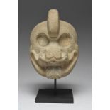 A Veracruz hacha Gulf Coast, Mexico, circa 200 - 400 AD volcanic stone, carved as a monkey head with