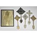 Five Ethiopian Coptic hand crosses brass, two with engraved images of angels, the longest 31cm,