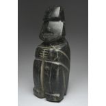 A Mezcala large seated stargazer figure Mexico, circa 700 - 300 BC dark green serpentine, with the