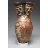 A Tuncahuan double spouted vessel Ecuador/Columbia, circa 300 BC - 800 AD each neck with a human