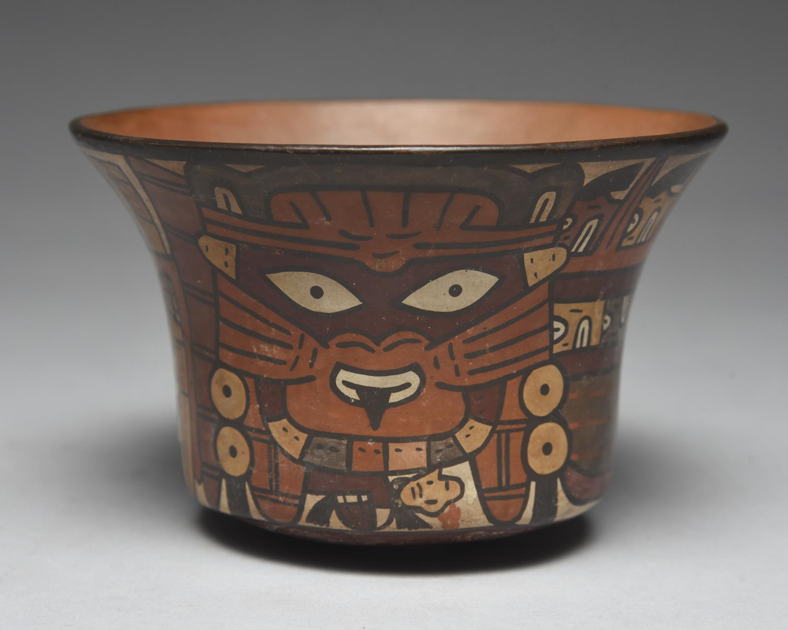 A Nazca bowl Peru, circa 200 - 600 AD pottery, painted a mythical flying being with trophy heads