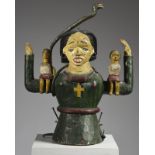 An Igbo head crest Nigeria carved the half figure of a women wearing a waistband, necklace and