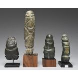 Four Mezcala figures Mexico, circa 300 - 100 BC including a rare greenstone seated maternity