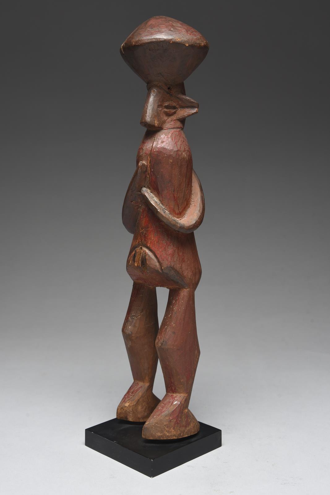 A Yaka standing female figure Nigeria with a lozenge coiffure, wide ears and grooved eyes, with - Image 2 of 5
