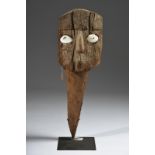 A Chancay mask Peru, circa 1100 - 1450 AD with applied shell eyes and hair lashes, with traces of