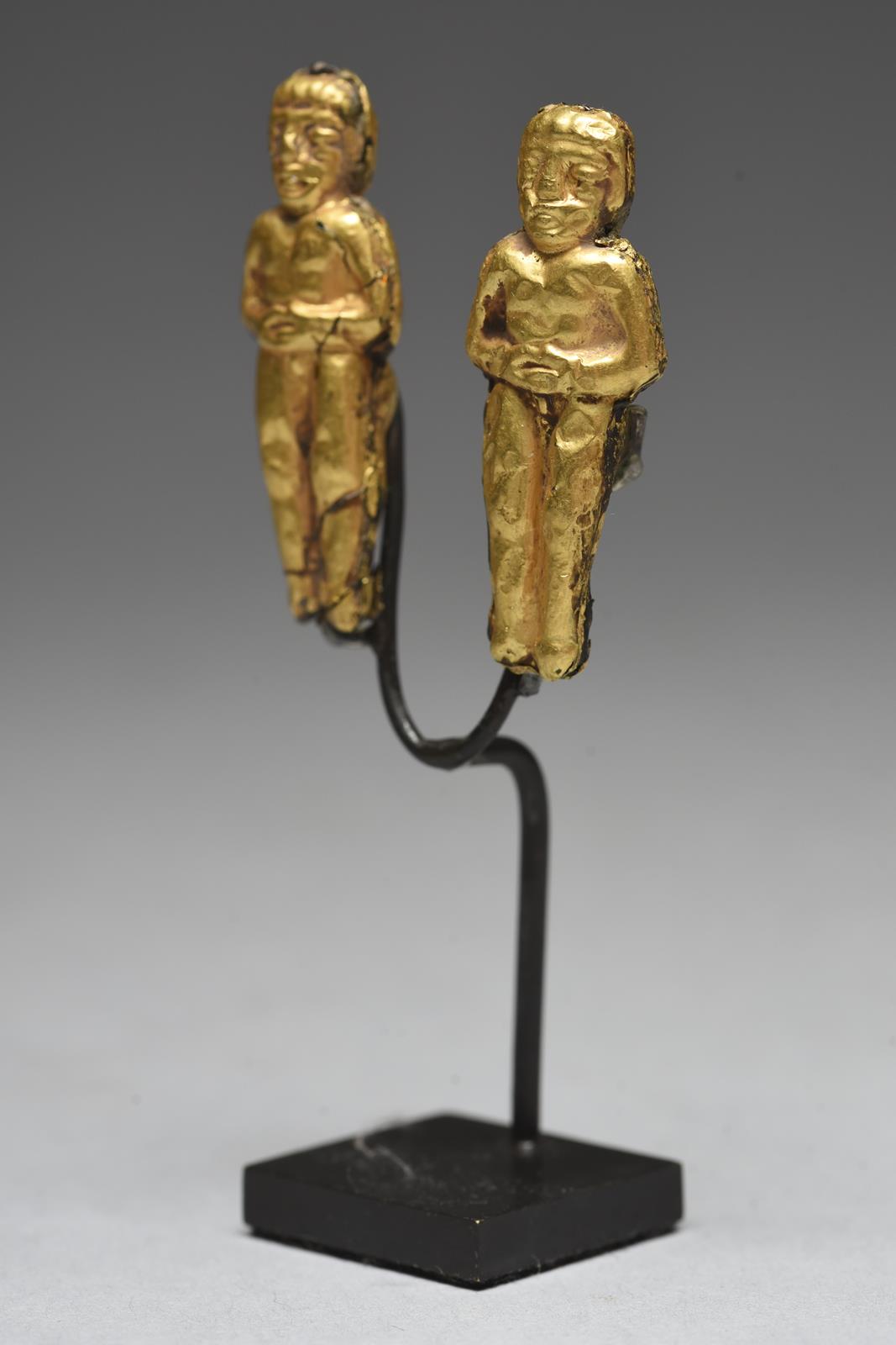 Two Chimu figural pendants Peru resin with gold leaf, one janus and all with hands folded onto the - Image 2 of 5