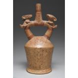 A Moche stirrup spout vessel Peru, circa 100 - 700 AD pottery, with all-over painted decoration of