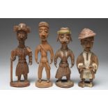 Thomas Ona. Four Yoruba standing figures Nigeria including a Mailman, wearing a peaked cap and a