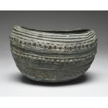 An Igbo bronze bowl Nigeria of navette shape, cast with linear bands and with circles and beads,