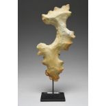 A Maya eccentric flint Mexico of knapped abstract form, 26cm high, on a stand. (2) Provenance Romy