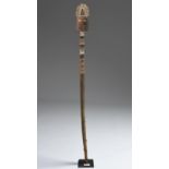 A Chancay staff Peru, circa 800 - 1200 AD with a janus mask having an open headdress on a part