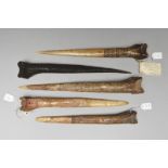 Five Abelam daggers Papua New Guinea cassowary bone, with stylised carved decoration, including a
