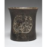 A Maya vessel Yucatan, Mexico, circa 500 - 950 AD blackware, of waisted cylinder form with two