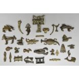 Twenty Nine Akan gold weights Ghana brass, including animals, birds, a cannon, a shield, a stool,