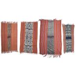 A Timor ikat selimut Indonesia with a central sungkit panel, 216cm x 129cm, and three Timor ikat