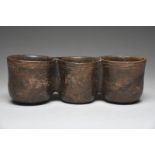 A Nicoya triple bowl Costa Rica pottery, linked with holes to the sides, with an incised linear