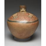 A Nazca jar Peru, circa 50 - 450 AD terracotta, the neck with a moulded human face wearing a hat