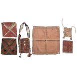 A Banjara bag Gujurat, India cotton, mirrors and cowrie shells, with a strap handle, 86cm long,