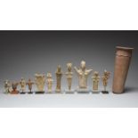 Ten Middle Eastern pottery figures and fragments five with beak-like noses, the highest 6.5cm high,