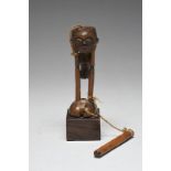 A Lulua figural tobacco mortar Democratic Republic of the Congo the squatting figure with a recessed