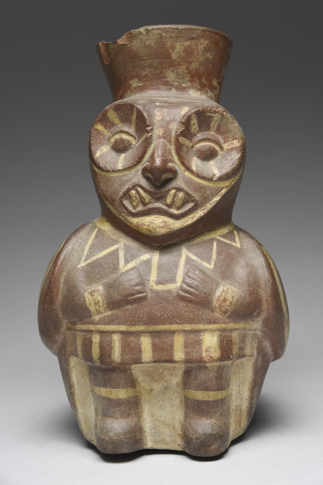 A Moche anthropomorphic vessel Peru, circa 100 - 700 AD terracotta, modelled as an owl human