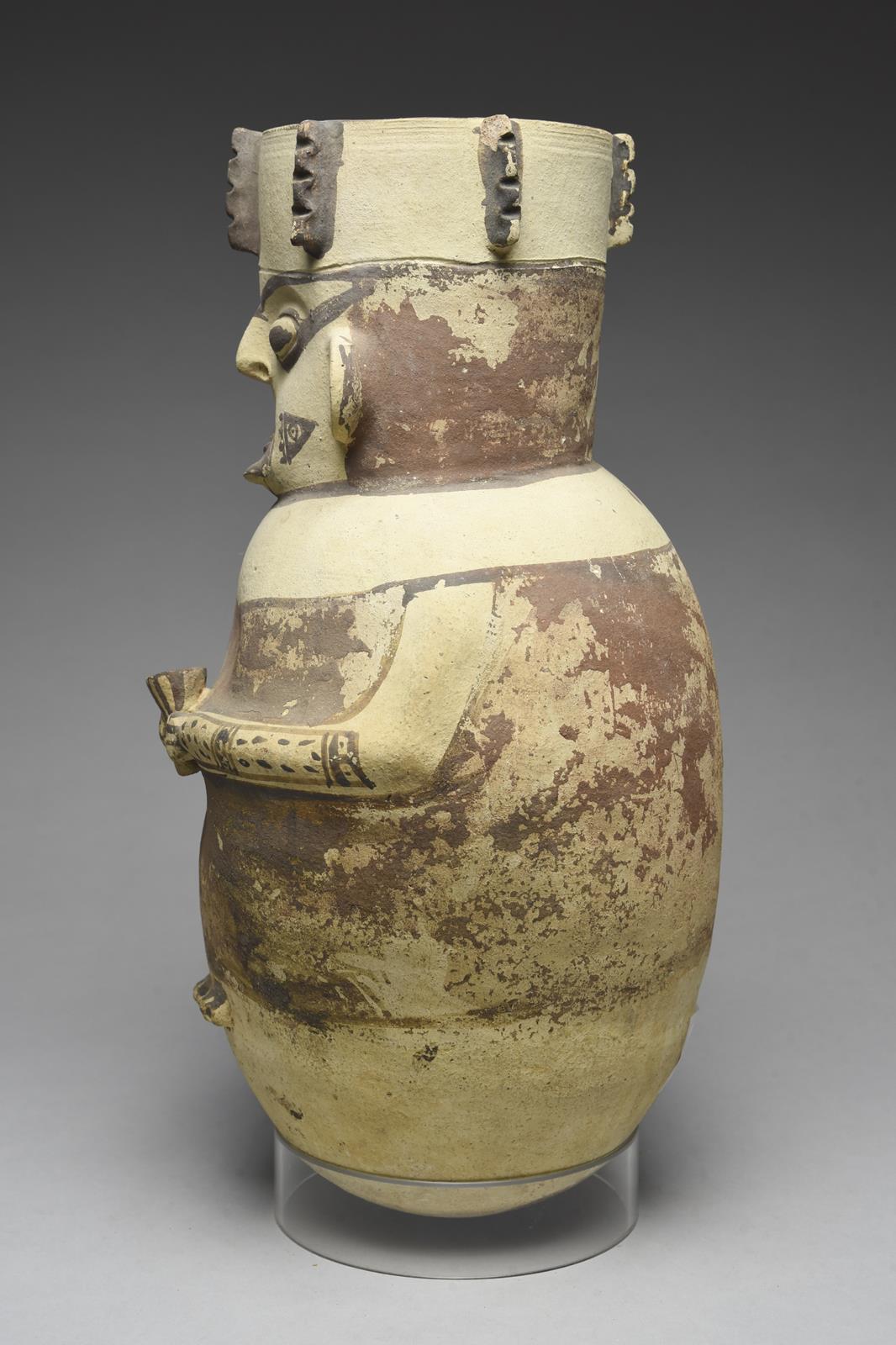 A Chancay figural vessel Peru, circa 1100 - 1400 AD pottery, relief modelled holding a cup, with a - Image 2 of 4