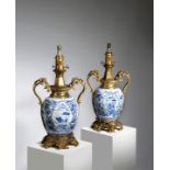 A PAIR OF CHINESE PORCELAIN BLUE AND WHITE VASE TABLE LAMPS THE PORCELAIN KANGXI, 1662-1722, THE