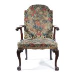A MAHOGANY OPEN ARMCHAIR IN GEORGE II STYLE MID-19TH CENTURY with floral gros-point tapestry