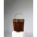 A GEORGE III MAHOGANY AND BRASS BOUND PEAT BUCKET PROBABLY IRISH, C.1790-1800 of tapering