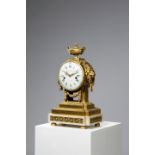 A FRENCH LOUIS XVI WHITE MARBLE AND ORMOLU MANTEL CLOCK BY CHARLES BERTRAND, PARIS, LATE 18TH