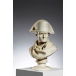 A FRENCH MARBLE BUST OF NAPOLEON MID-19TH CENTURY the Emperor wearing his bi-corn hat, looking