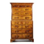 A GEORGE II BURR WALNUT SECRETAIRE CHEST ON CHEST C.1730 AND LATER with feather and crossbanding and