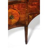 A GEORGE III MAHOGANY AND MARQUETRY SERPENTINE SIDEBOARD PROBABLY IRISH, LATE 18TH CENTURY AND LATER