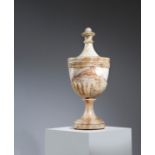AN ALABASTER URN AND COVER LATE 18TH / EARLY 19TH CENTURY the cover with a beaded and turned knop,