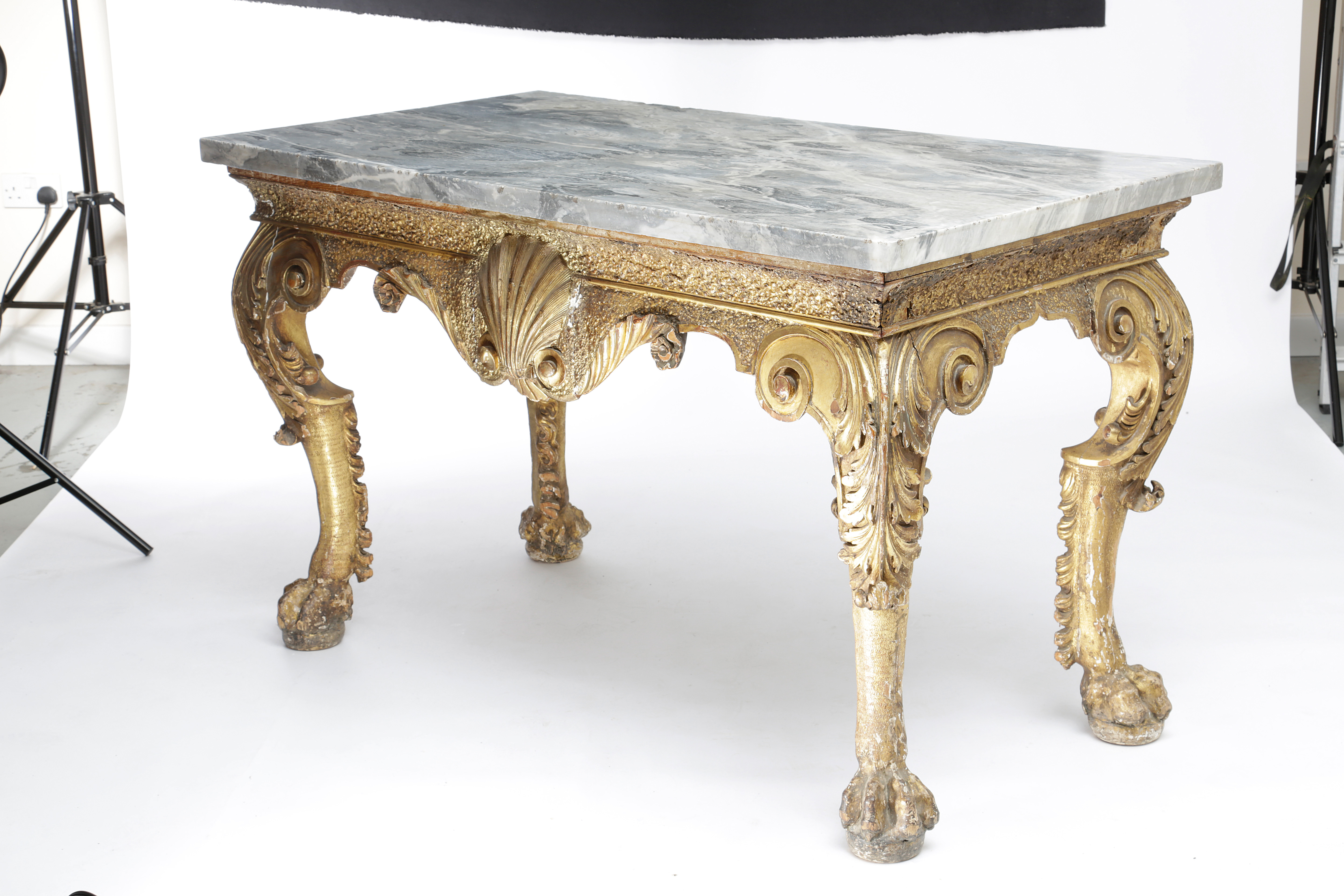 A PAIR OF FRENCH GILTWOOD CONSOLE TABLES IN LOUIS XV STYLE. 19TH CENTURY each with a red and grey - Image 7 of 8