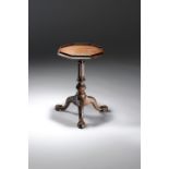 AN EARLY GEORGE III MAHOGANY KETTLE STAND C.1760 the octagonal moulded top with a raised gallery,