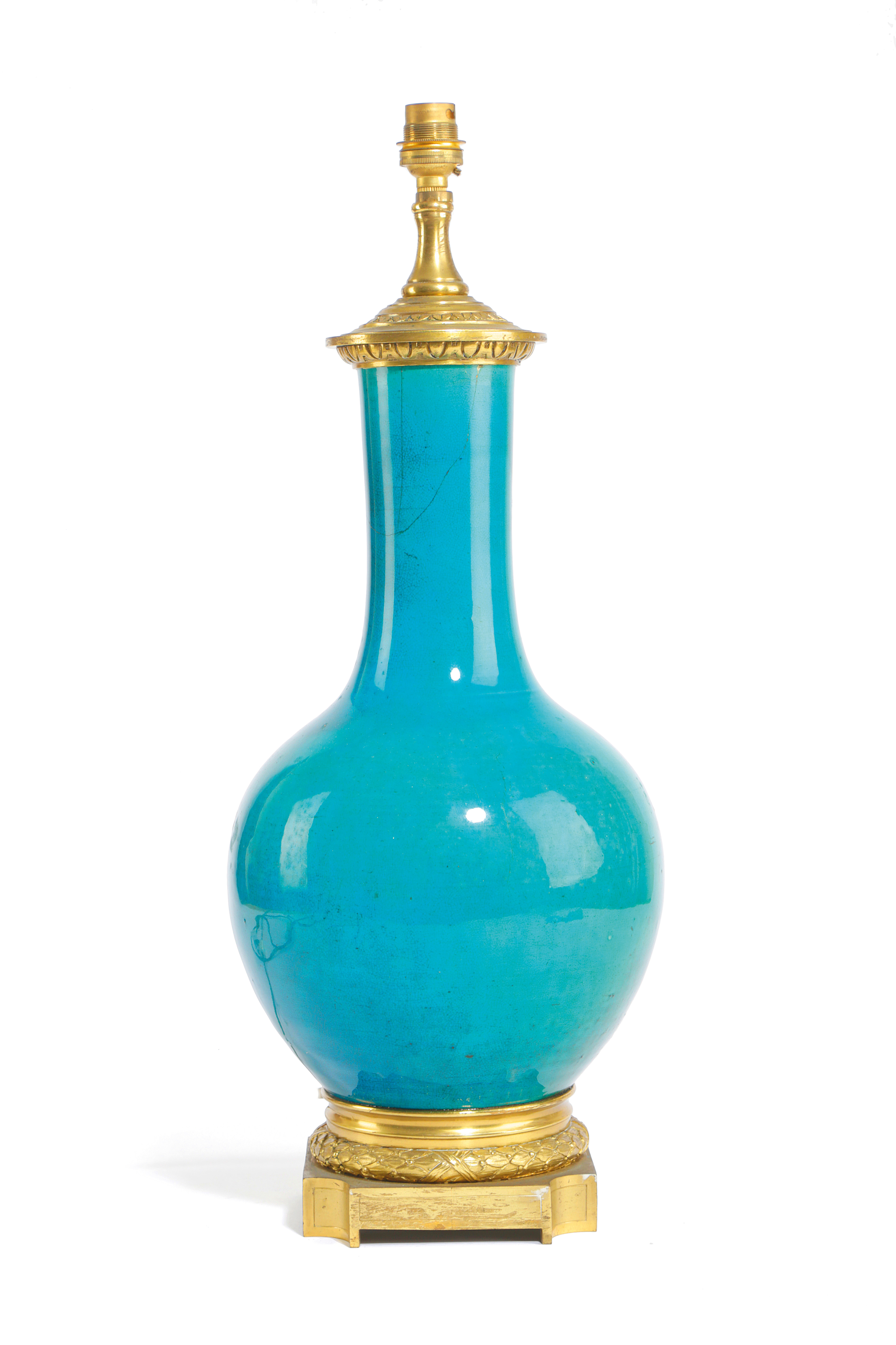 A CHINESE PORCELAIN VASE TABLE LAMP 19TH CENTURY the turquoise glazed body with stiff leaf and