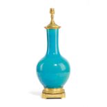 A CHINESE PORCELAIN VASE TABLE LAMP 19TH CENTURY the turquoise glazed body with stiff leaf and
