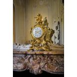 A FRENCH ORMOLU MANTEL CLOCK IN LOUIS XV STYLE, 19TH CENTURY the brass drum movement with an outside