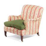 AN EDWARDIAN EASY ARMCHAIR BY HOWARD & SONS, EARLY 20TH CENTURY with Howard floral and red stripe