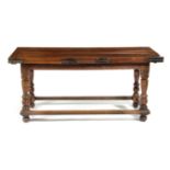 A FRANCO-FLEMISH WALNUT DRAW-LEAF REFECTORY TABLE IN 17TH CENTURY STYLE, PROBABLY 19TH CENTURY