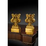 A PAIR OF FRENCH ORMOLU URNS IN LOUIS XVI STYLE IN THE MANNER OF PIERRE GOUTHIERE, 19TH CENTURY each