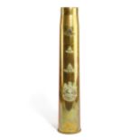 A BRASS TRENCH ART ARTILLERY SHELL STICKSTAND DATED '1942' applied with four Royal Artillery crests,