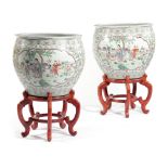 A PAIR OF CHINESE FAMILLE ROSE JARDINIERES OR FISH BOWLS 20TH CENTURY painted with cartouches of